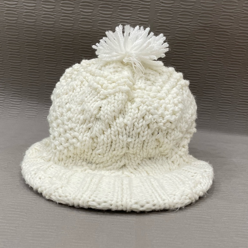 Crocheted peaked cap